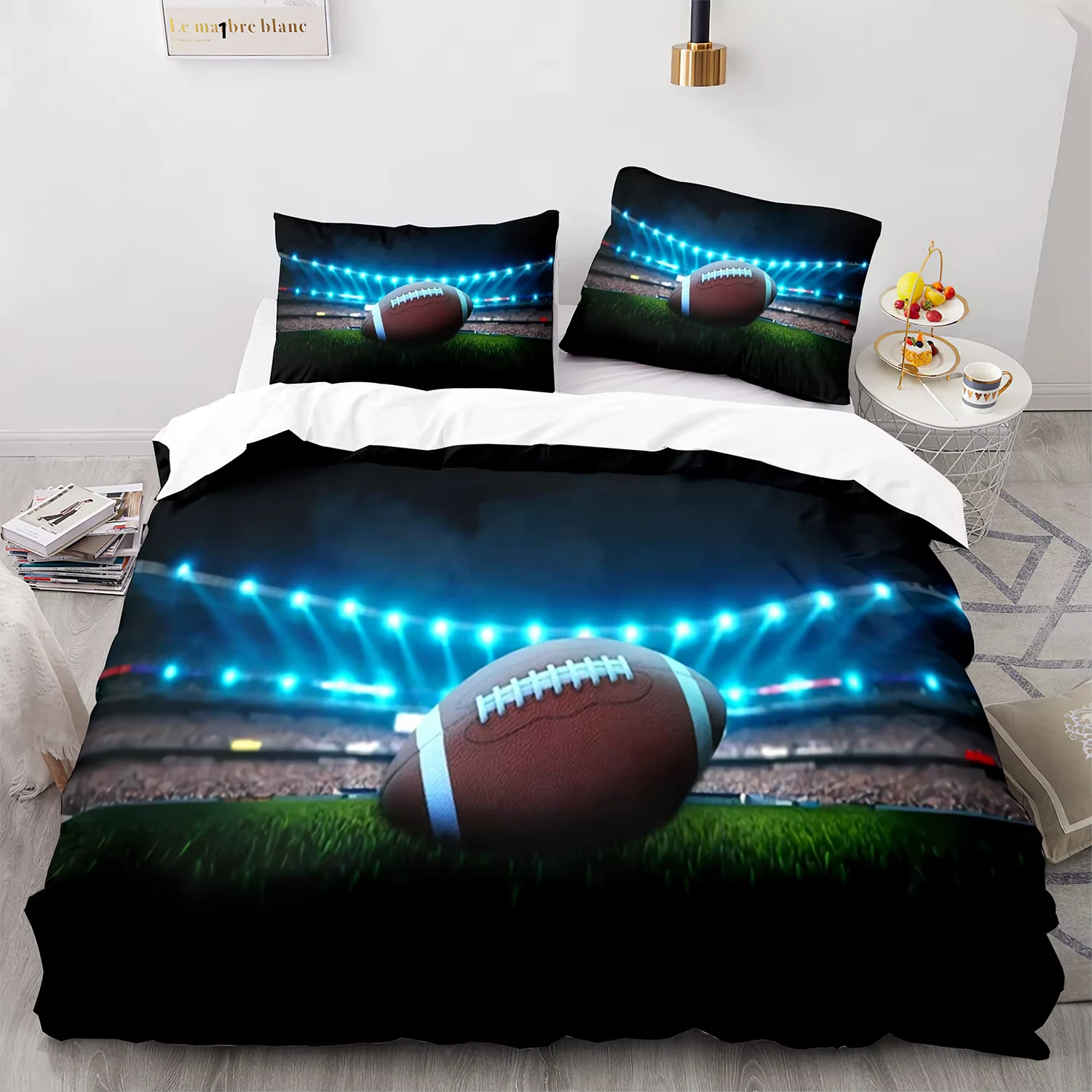 American football stadium themed bedding set displayed on a bed